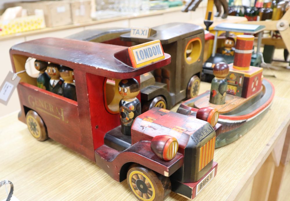 A collection of hand-crafted painted wooden toys, 1980s,